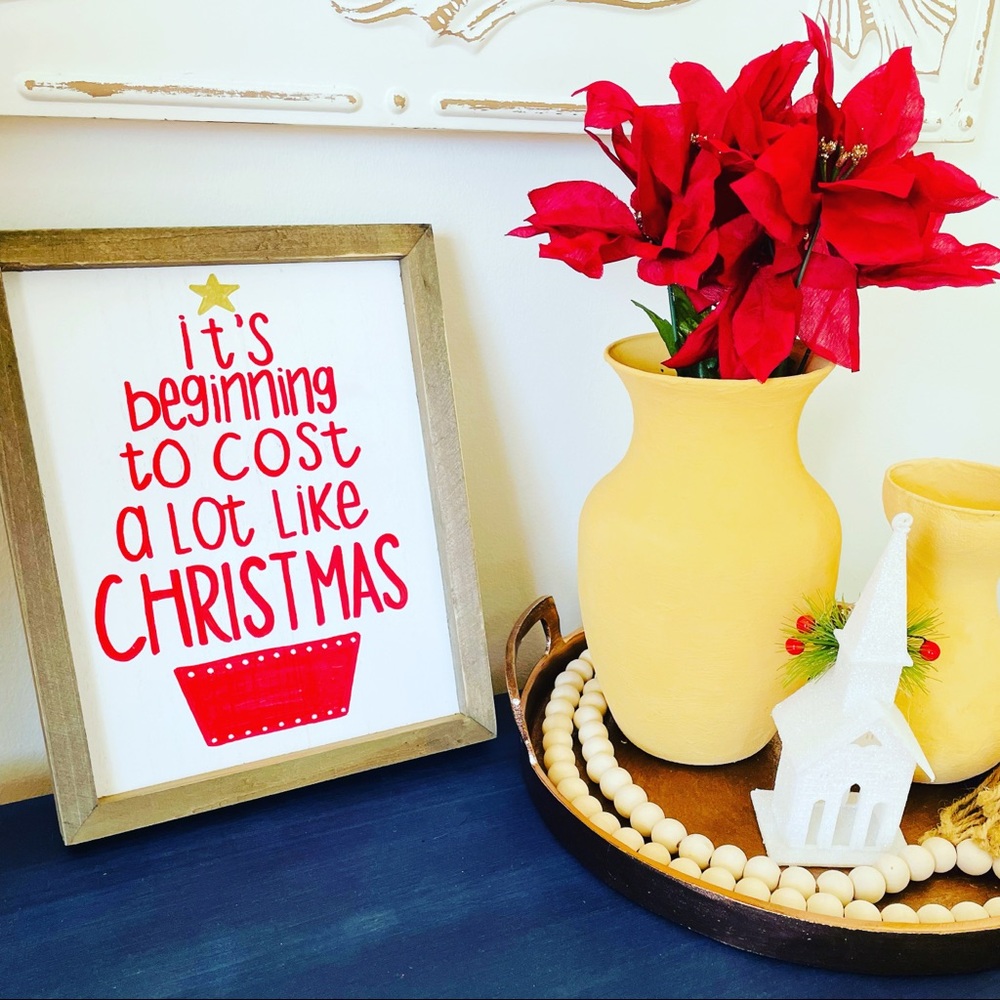 Cost A Lot Like Christmas Sign